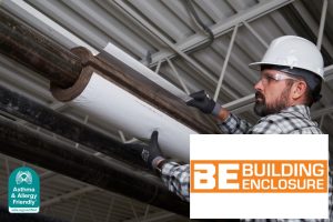 Worker installing Knauf Performance+® pipe insulation certified Asthma & Allergy Friendly®, featured in Building Enclosure