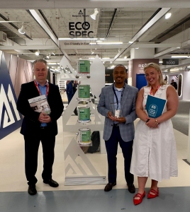 Benjamin Moore representatives with Allergy Standards Ltd at Eco Spec® paint display, receiving Asthma & Allergy Friendly® Certification award.