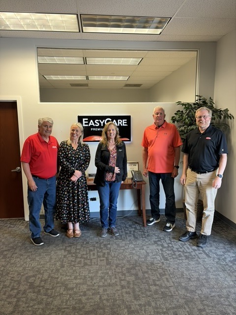 Leah McInerney of the Asthma & Allergy Friendly® Certification Program with the True Value EasyCare team at their manufacturing facility in Cary, Illinois, during the May 2026 Chicago Trade Mission.